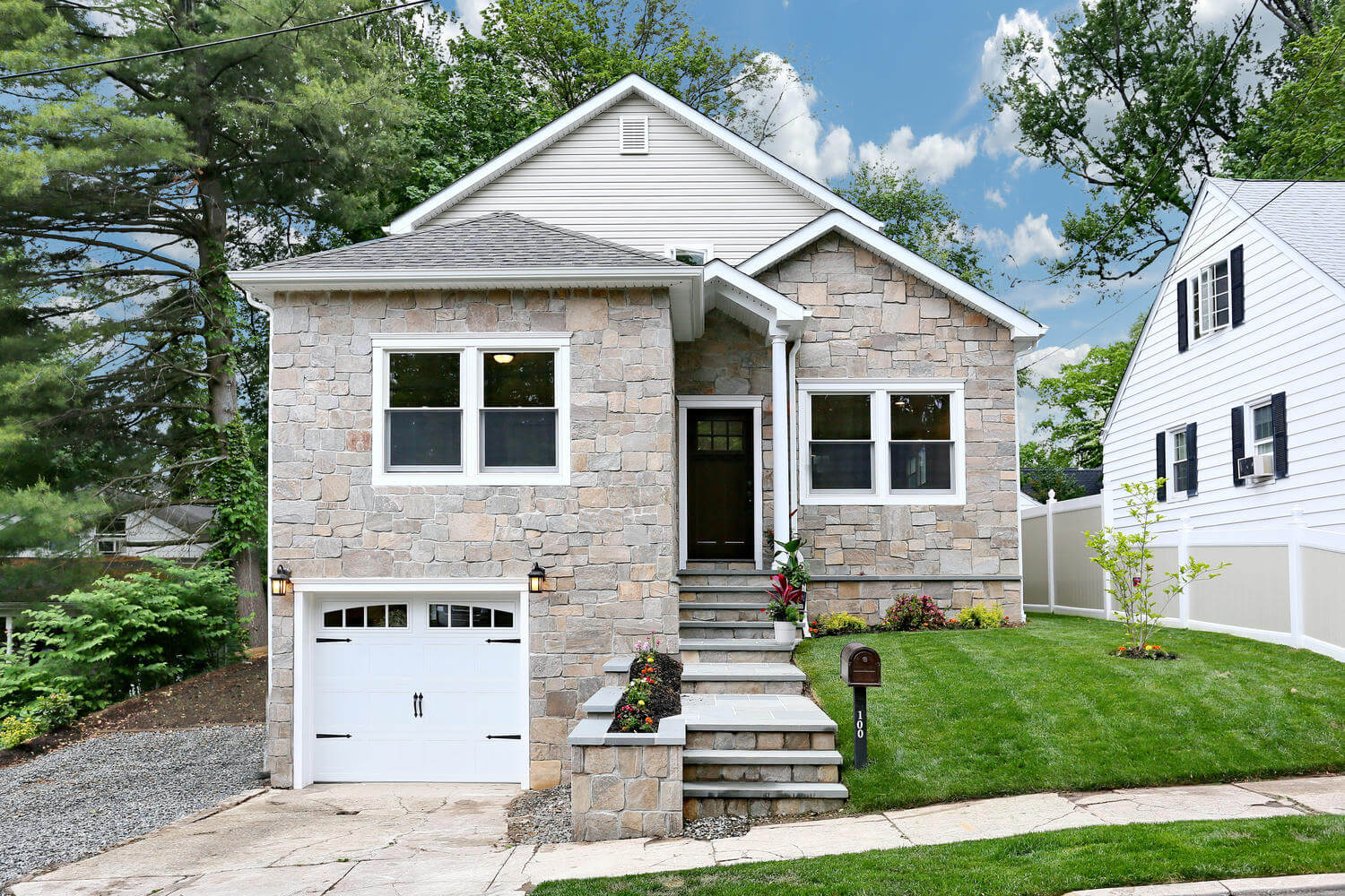 Whole-home renovation with stone facade in Hillsdale NJ by Dadak LLC