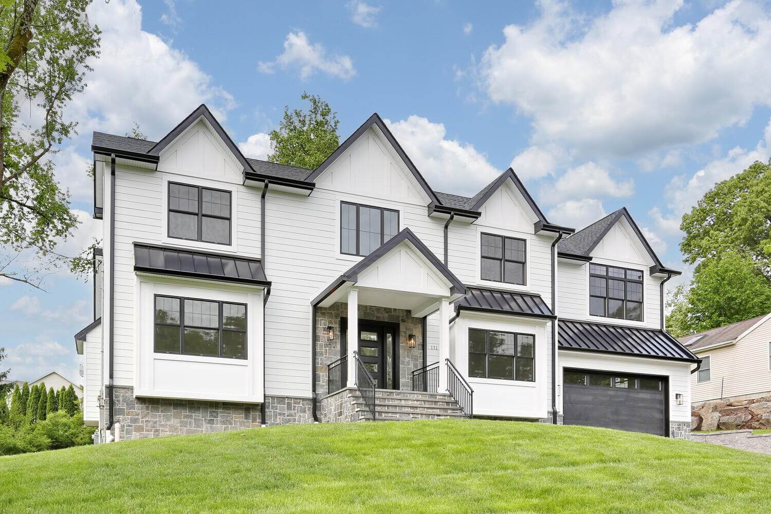 Park Ridge modern farmhouse exterior built by Dadak LLC